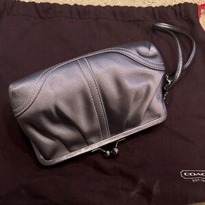 Adorable silver Coach kisslock wristlet